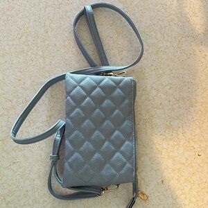 Padded baby blue purse
